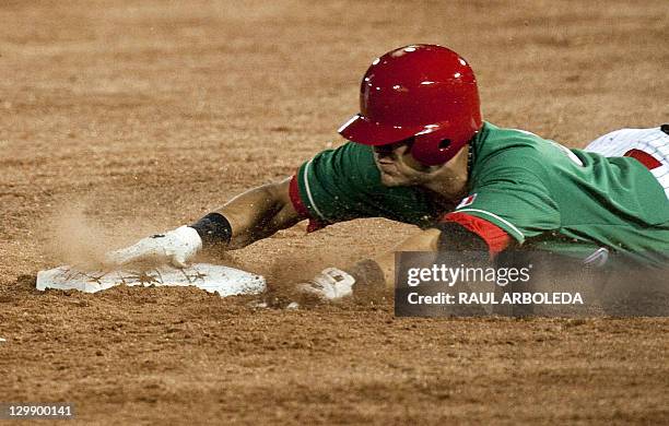 Mexican Agustin Murillo touches the second base during their match against Dominican Republic in the XVI Panamerican Games in Lagos de Moreno, State...