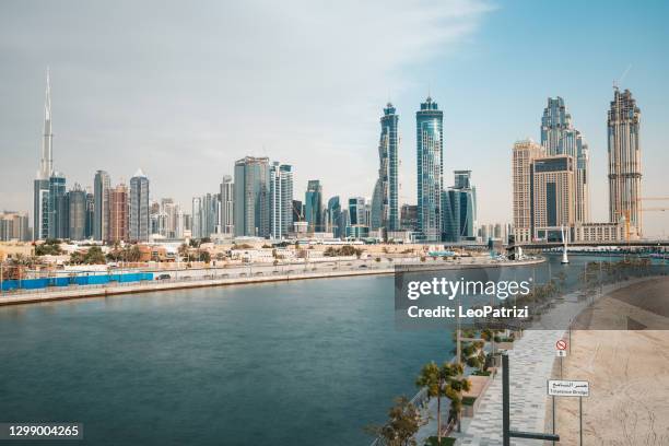 dubai buildings - dubai water canal stock pictures, royalty-free photos & images