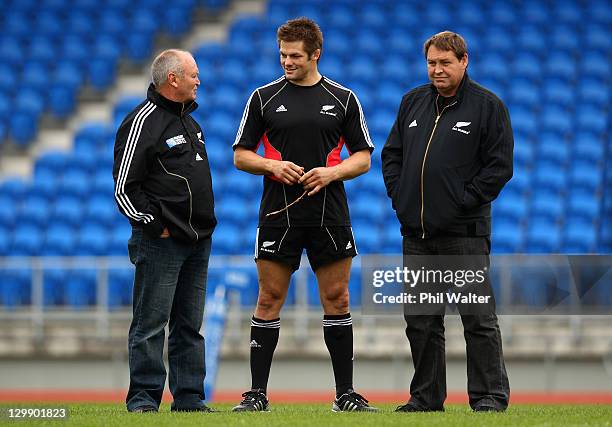 All Black Captain Richie McCaw talks with coach Graham Henry and assistant coach Steve Hansen during a New Zealand All Blacks captain's run at Trusts...