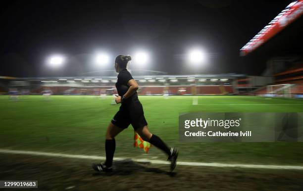 General view as the assistant referee runs the line during the Barclays FA Women's Super League match between Aston Villa Women and Chelsea Women at...