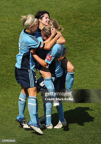 Renee Rolloson of Sydney FC celebrates with her team mates after scoring a goal during the round one W-League match between Sydney FC and Brisbane...