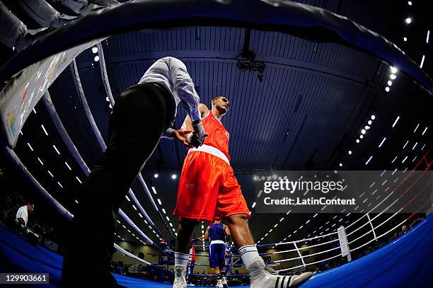 Juan Romero of Mexico lost his combat with Roniel Iglesias of Cuba during the Men's Light Welter -64kg boxing as part of 2011 XVI Pan American Games...