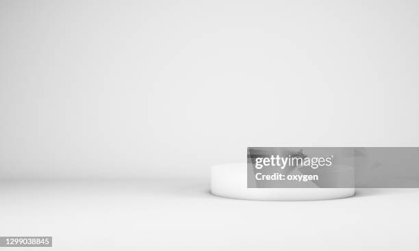 abstract 3d rendering cylinder podium background. minimalism white still life stylete - awards show stock-fotos und bilder