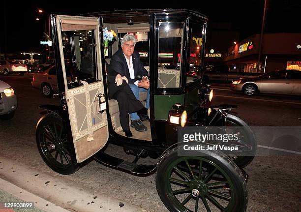 Jay Leno arrives in his 1909 Baker Electric car at "Revenge Of The Electric Car" Premiere held at Landmark Nuart Theatre on October 21, 2011 in Los...