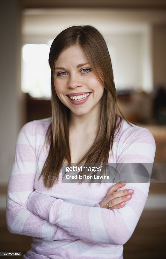 Teen girl with toothy smile, portrait