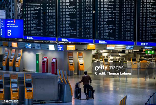 Passengers pictured in the Terminal 1 of the Frankfurt Airport on January 28, 2021 in Frankfurt, Germany. Border police check passengers arriving...