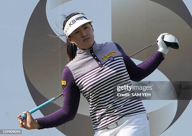 Amy Yang of South Korea stretches before teeing off on 9th hole during the third round of the Sunrise LPGA Taiwan Championship golf tournament in...