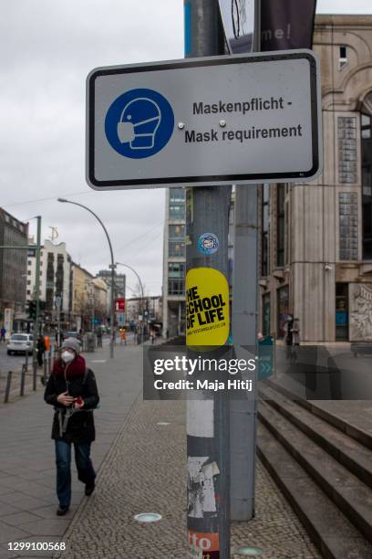 Sign that reads "Mask requirement" stands during the second wave of the coronavirus pandemic on January 28, 2021 in Berlin, Germany. The German...