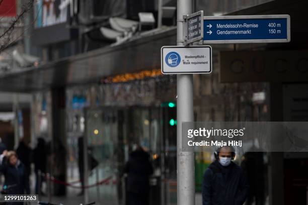 Sign that reads "Mask requirement" stands during the second wave of the coronavirus pandemic on January 28, 2021 in Berlin, Germany. The German...