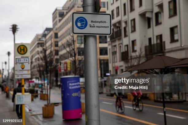 Sign that reads "Mask requirement" stands during the second wave of the coronavirus pandemic on January 28, 2021 in Berlin, Germany. The German...