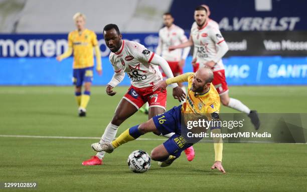 Steve De Ridder of STVV battles for the ball with Fabrice Olinga of Mouscron during the Jupiler Pro League match between STVV and Royal Excel...