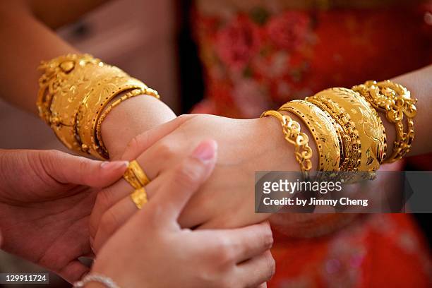 golden celebration - wedding jewellery stock pictures, royalty-free photos & images