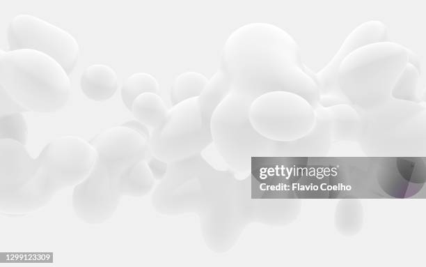 subtle white on white background depicting fluidity, ease and flow - bubbles photos et images de collection