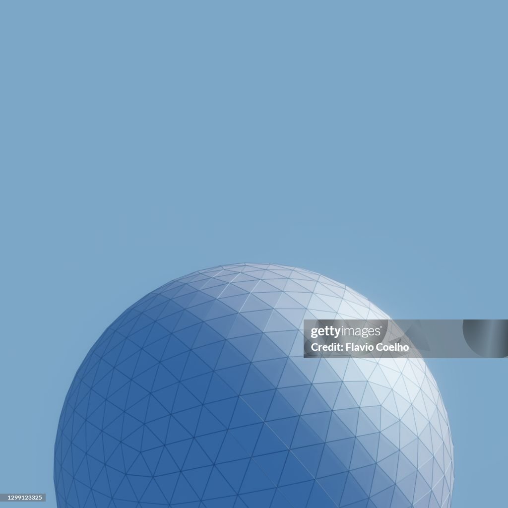 View from below of a large geodesic dome 3D model on blue background