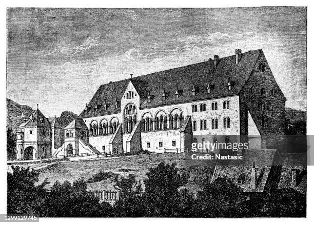 the imperial palace of goslar is a historical building complex at the foot of the rammelsberg hill in the south of the town of goslar north of the harz mountains, central germany - goslar stock illustrations