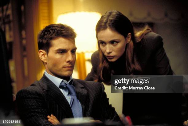 American actor Tom Cruise as Ethan Hunt and French actress Emmanuelle Beart as Claire Phelps in a scene from the film 'Mission: Impossible', 1996.