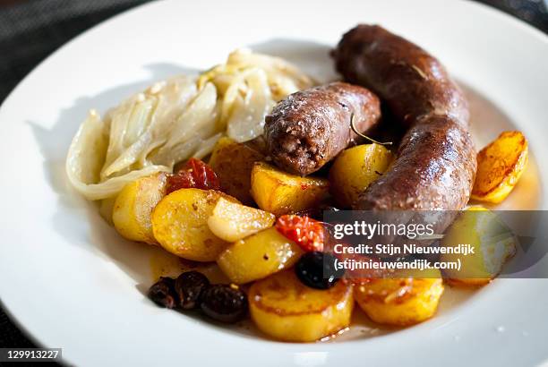 fried potatoes and fennel sausage - nieuwendijk stock pictures, royalty-free photos & images