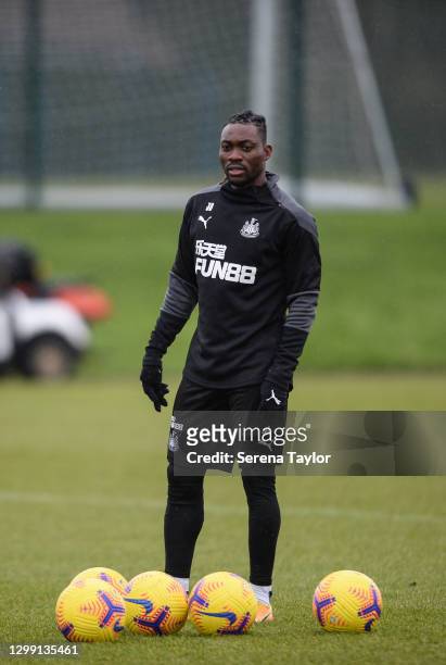 Christian Atsu stands with training balls during the Newcastle United Training Session at the Newcastle United Training Centre on January 28, 2021 in...