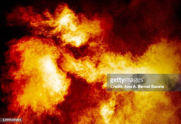explosion with fire, smoke and  sparks on a black background - shooting a weapon stock pictures, royalty-free photos & images