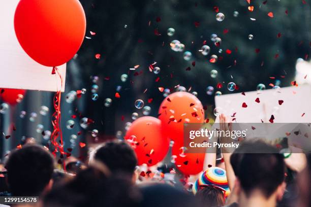 straßenfest - confetti explosion stock-fotos und bilder