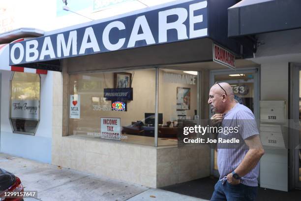 Michael Khoury stands outside of his Leading Insurance Agency, which offers plans under the Affordable Care Act on January 28, 2021 in Miami,...