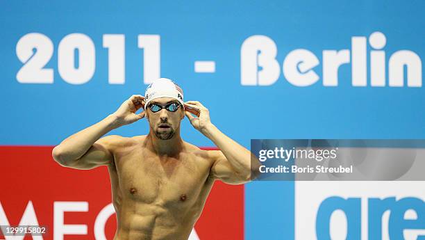 Michael Phelps of USA prepares for the start of the men's 100 m individual medley heat during day one of the Swimming World Cup 2011 at the...