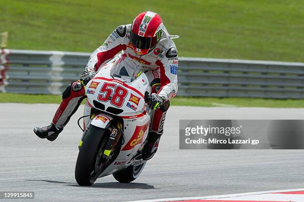 Marco Simoncelli of Italy and San Carlo Honda Gresini heads down a straight during the qualifying practice of MotoGP of Malaysia at Sepang Circuit on...