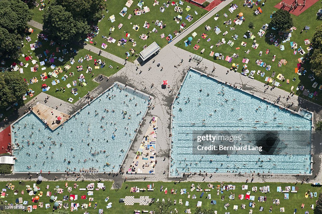 Crowded open air pools, aerial view