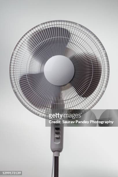 pedestal fan turned on - electric fan stock pictures, royalty-free photos & images