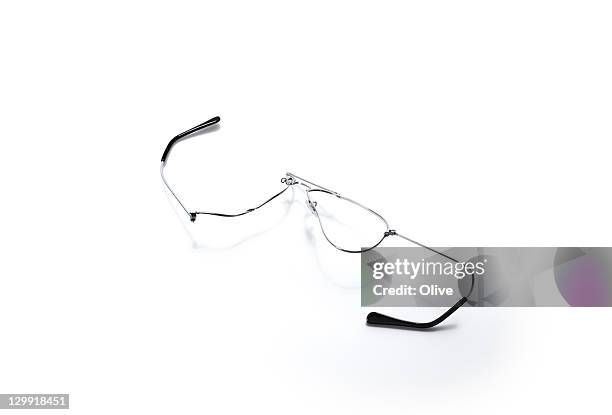 broken goggles on road - brille kaputt stock-fotos und bilder