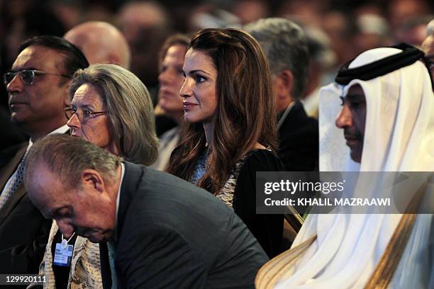 Hilde Schwab, wife of World Economic Forum founder and executive chairman Klaus Schwab, Jordan's Queen Rania, Spanish King Juan Carlos and Qatari...