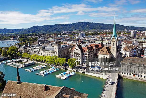 skyline of zurich and limmat river - zürich stock-fotos und bilder