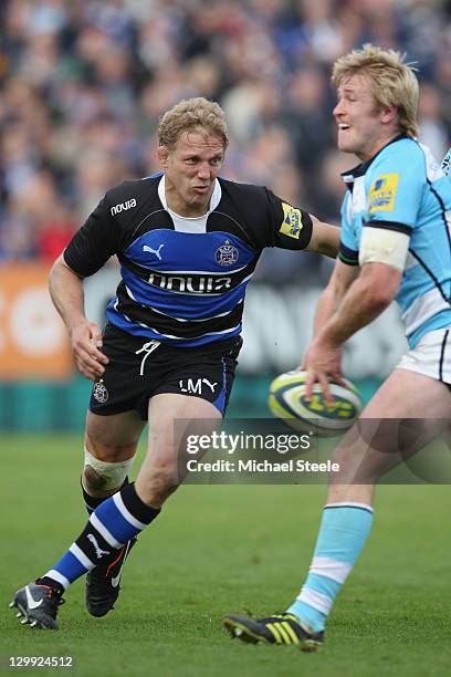 Lewis Moody of Bath closes in on Joe Carlisle of Worcester Warriors during the LV Cup match between Bath and Worcester Warriors at the Recreation...