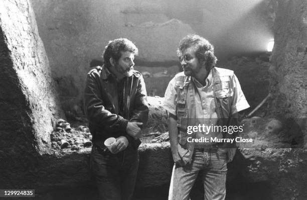 Executive producer George Lucas and director Steven Spielberg on the set of the film 'Indiana Jones and the Last Crusade', 1989. Presumably in the...