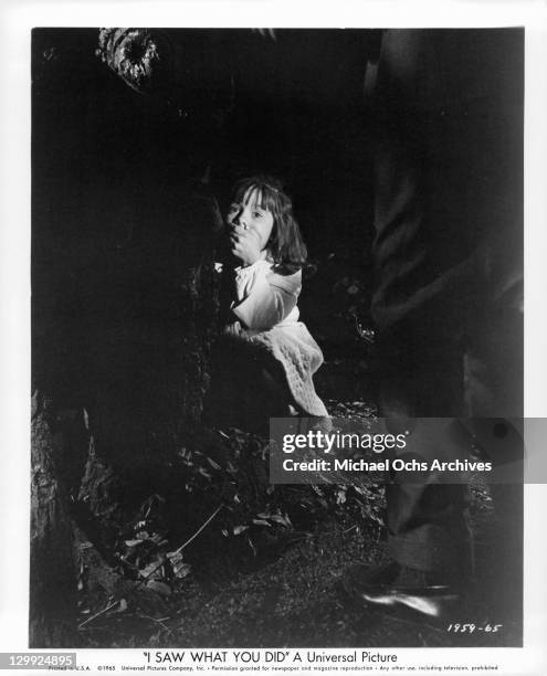 Sharyl Locke is being terrorized by the stalker that is walking toward her in a scene from the film 'I Saw What You Did', 1965.