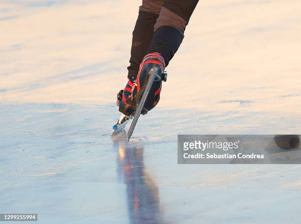 feet with ice skates, the year the skates are closed, the ski slopes. - pointed foot stock pictures, royalty-free photos & images