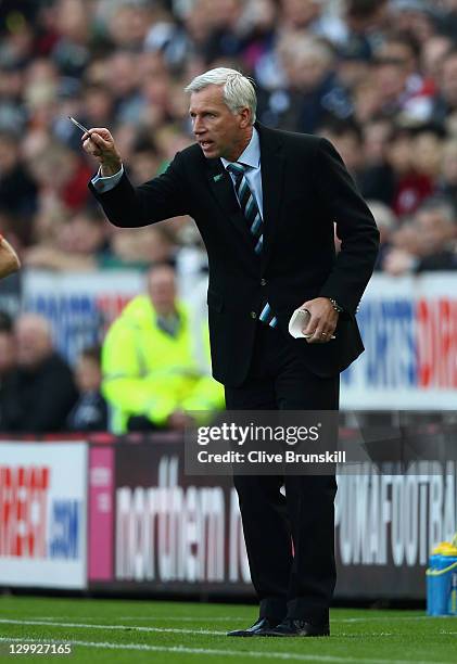 Newcastle United manager Alan Pardew shouts instructions to his team during the Barclays Premier League match between Newcastle United and Wigan...