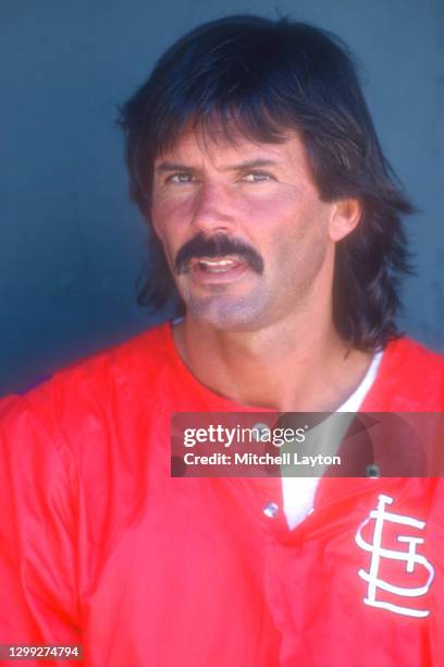 Dennis Eckersley of the St. Louis Cardinals looks on before a spring training baseball game against the Philadelphia Phillies at Carpenter Field on...