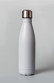 Grey reusable bottle on grey background
