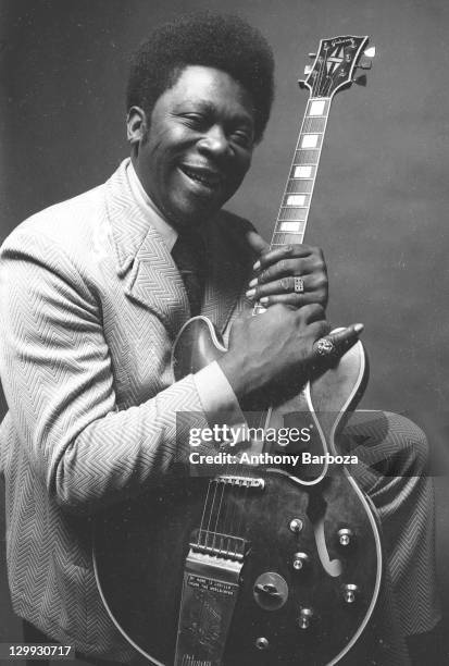 Portrait of American blues musician B.B. King as he poses with his guitar, New York, New York, 1971.