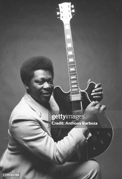 Portrait of American blues musician B.B. King as he poses with his guitar, New York, New York, 1971.