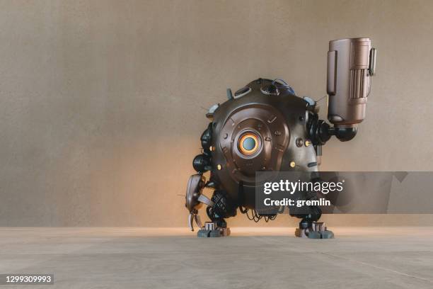 robot futuristico con pistola - gigante personaggio fantastico foto e immagini stock