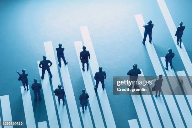 group of people at different starting positions - rivalry stock pictures, royalty-free photos & images