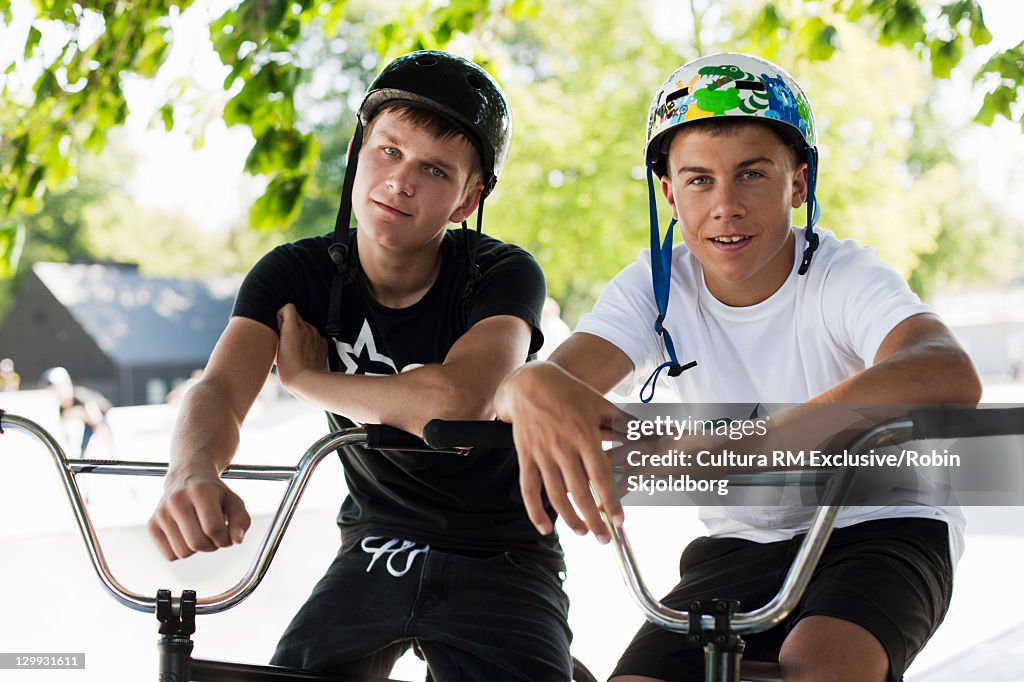 Teenage boys riding bmx bikes