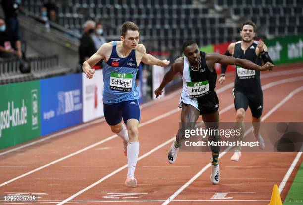 Marvin Schlegel of Germany beats Thomas Jordier of France in the Men's 400m 1st heat during the Indoor Track and Field Meeting Karlsruhe at...
