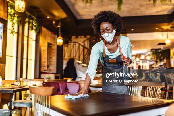 stop the spread by maintaining healthy habits - overworked waitress stock pictures, royalty-free photos & images