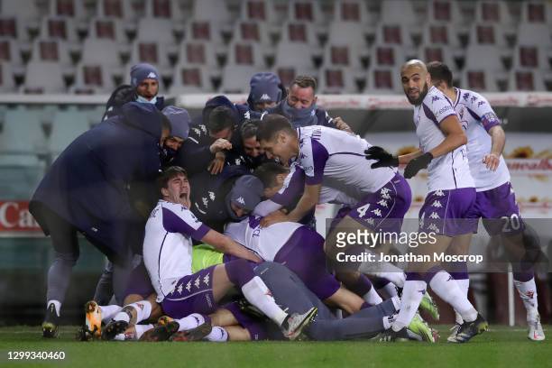 Franck Ribery of ACF Fiorentina celebrates with team mates after scoring to give the side a 1-0 lead during the Serie A match between Torino FC and...