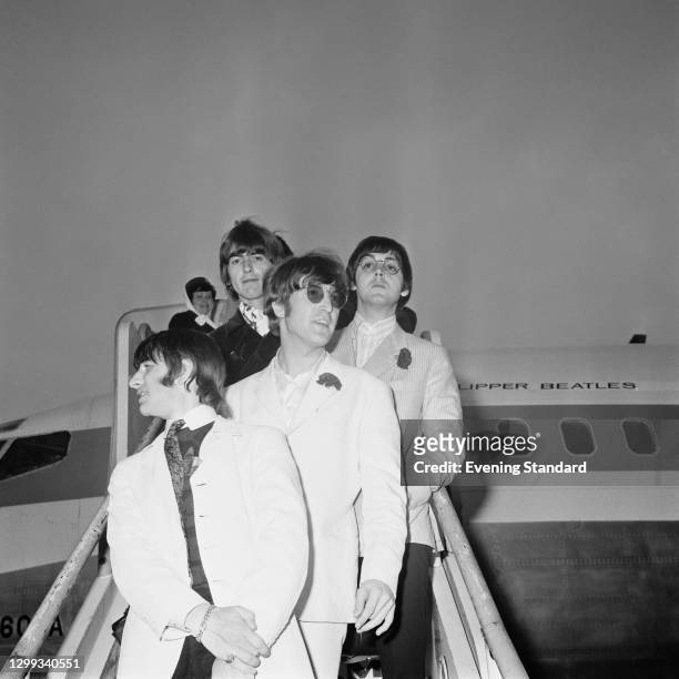 British rock group the Beatles arrive at London Airport on the 'Clipper Beatles', after their final concert tour of the United States, UK, 31st...