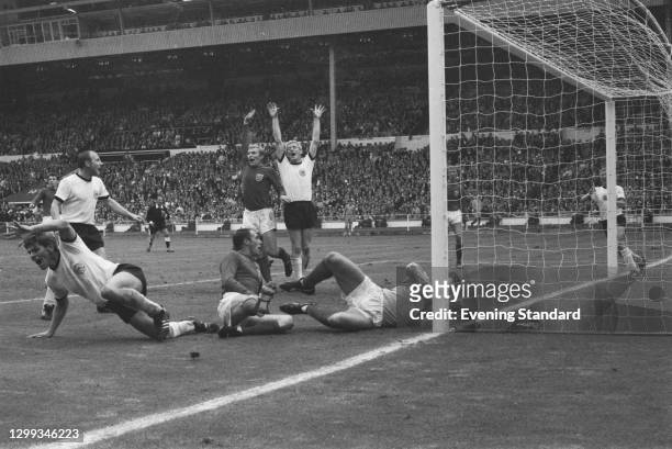 West Germany scores a second goal during the FIFA World Cup Final against England at Wembley Stadium, London, UK, 30th July 1966. From left to right,...