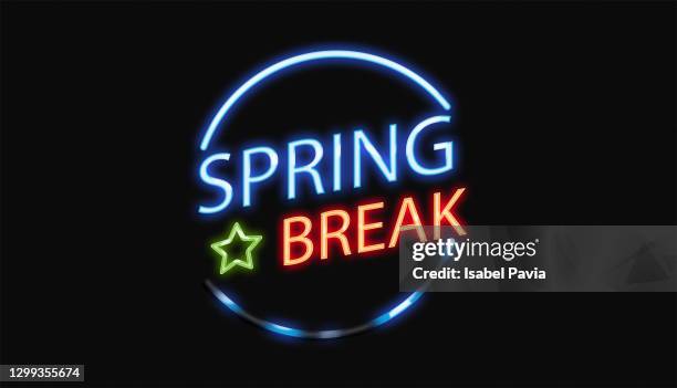 spring break sign in neon lights - spring break photos et images de collection